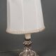 Louis XIV style 19th century silver or silver metal lamp with white lampshade