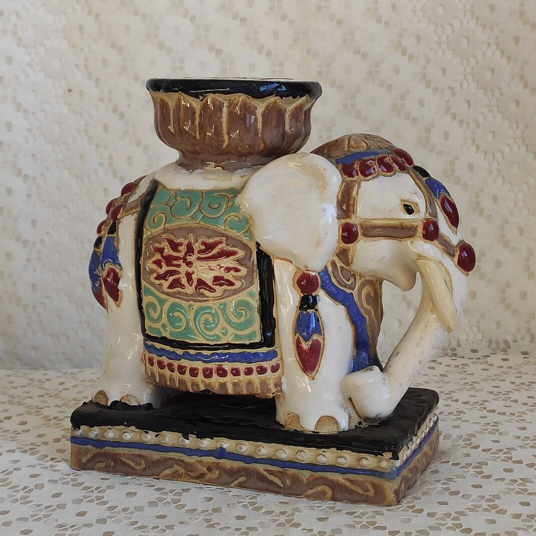 Enamelled ceramic plant holder