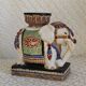 Enamelled ceramic plant holder