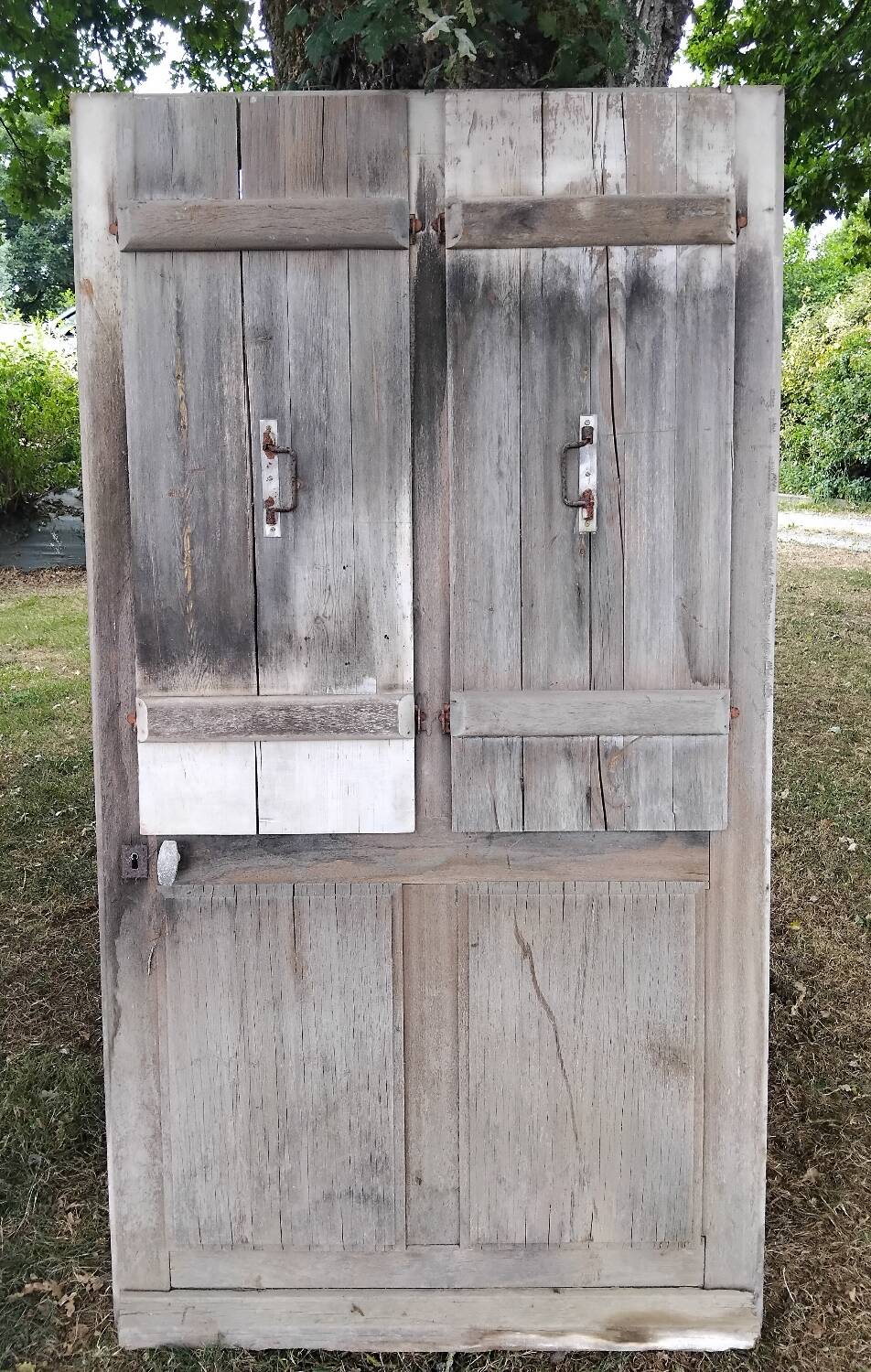 Old door with vintage wooden shutters