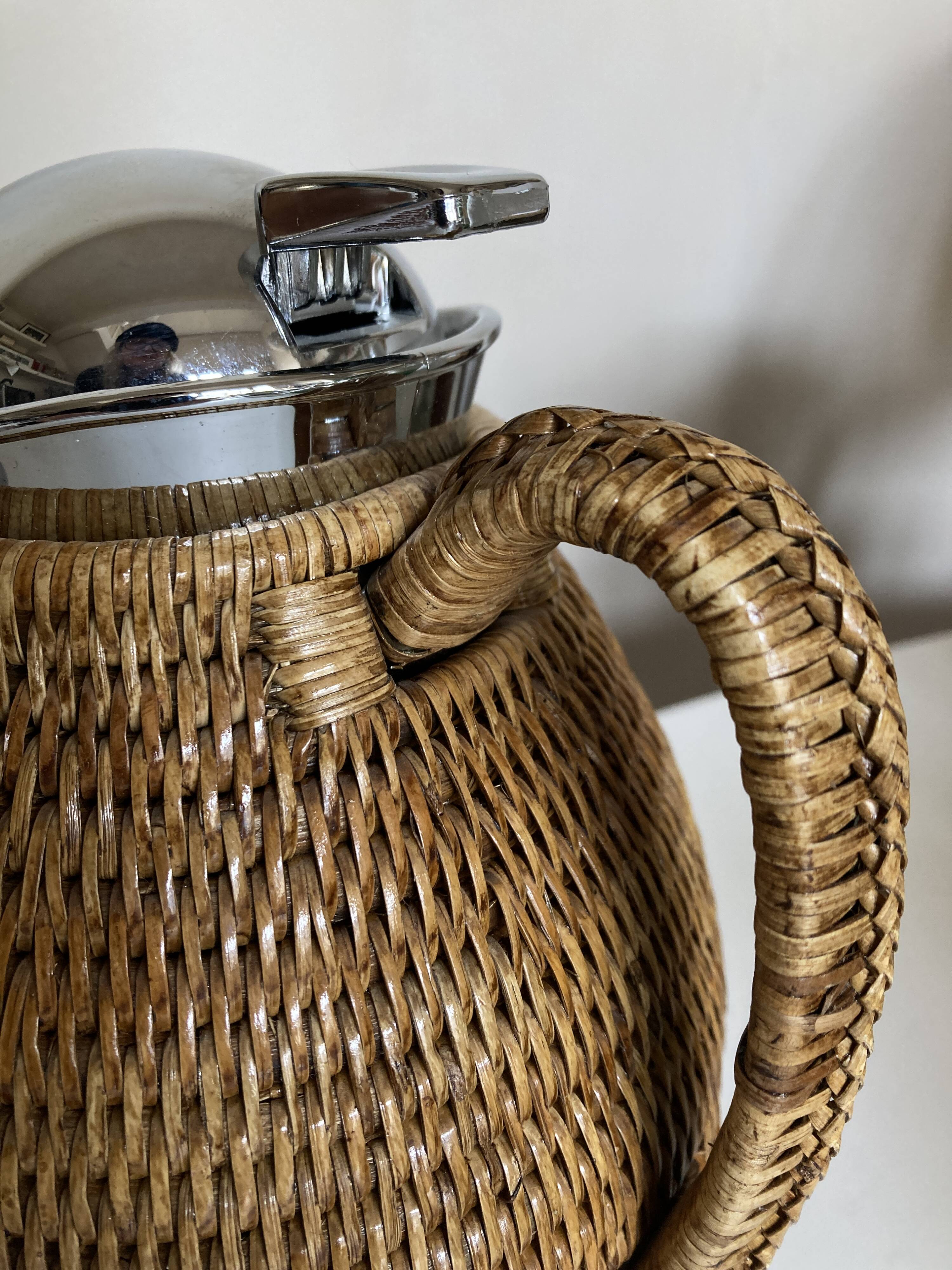 Wicker-covered thermos carafe designed by Ola Olson for Xtra 1980.