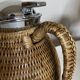 Wicker-covered thermos carafe designed by Ola Olson for Xtra 1980.