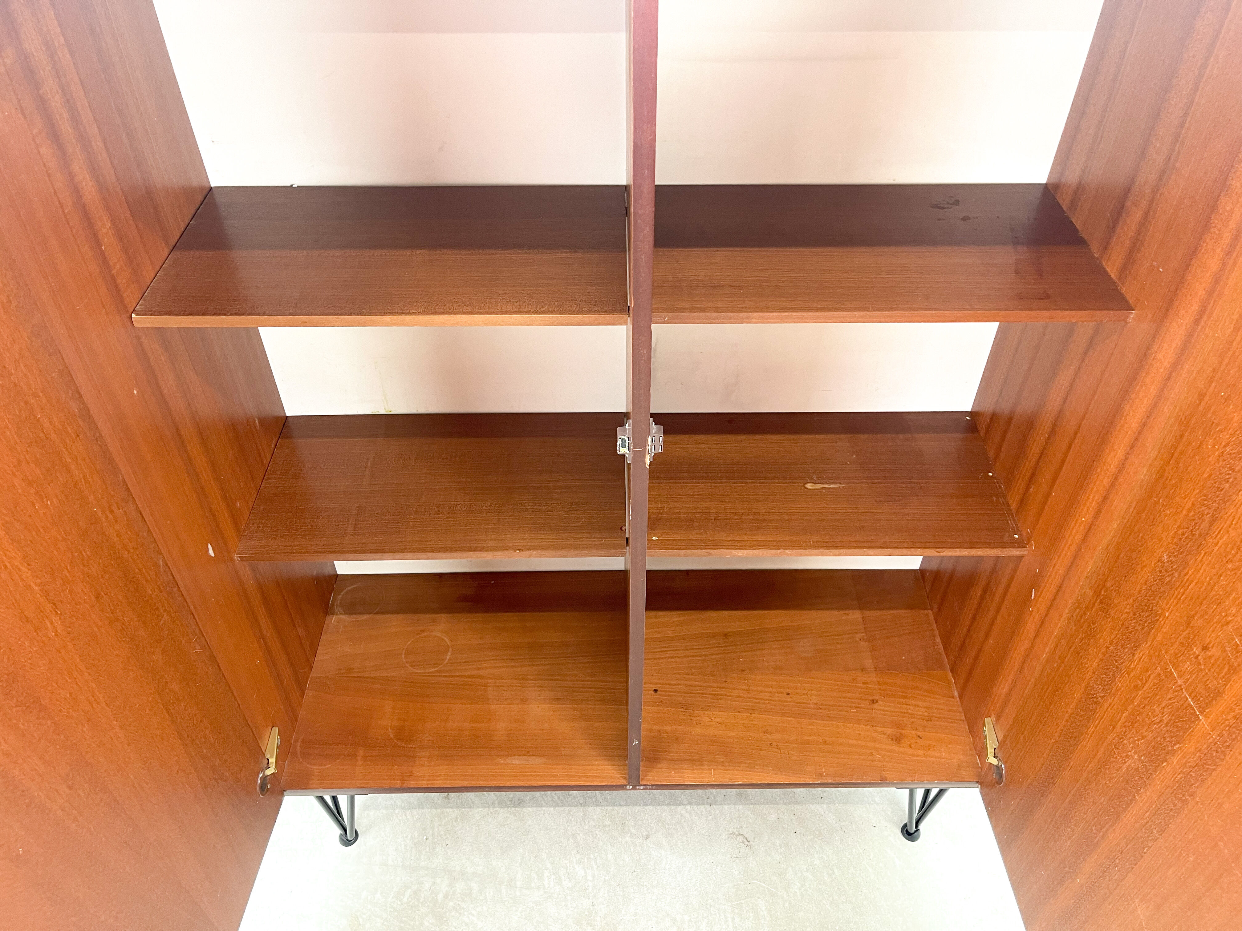 Rosewood cabinet with hairpin legs