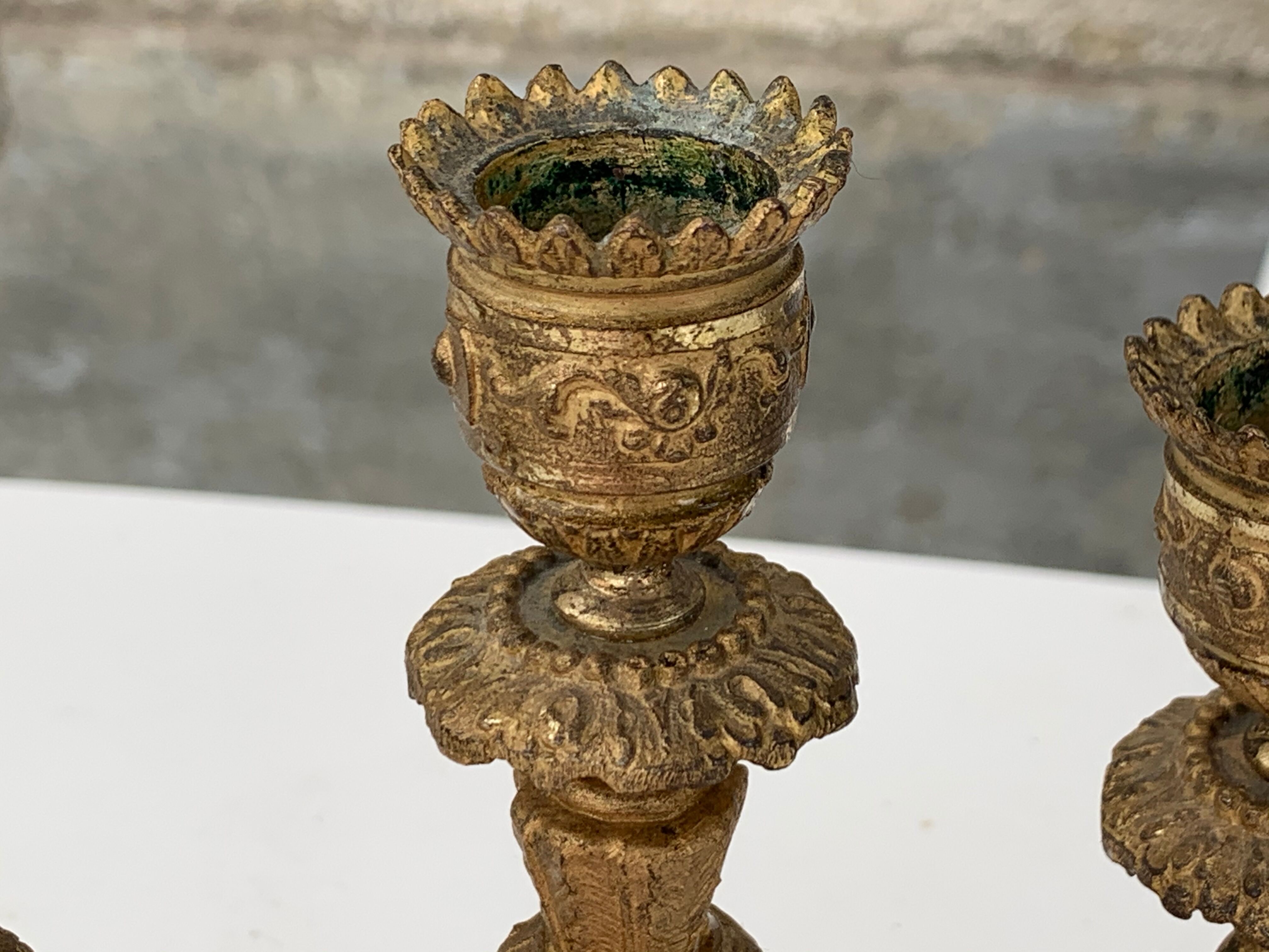 Old chiseled brass chandelier, 3 candlesticks, baroque floral pattern
