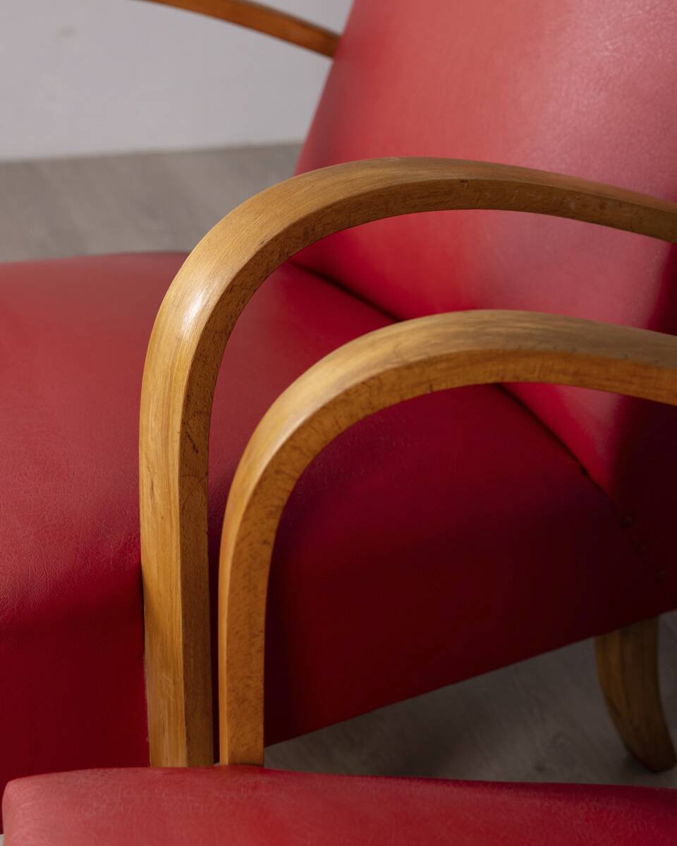 Pair of vintage 1950's armchairs in red leather, italian design