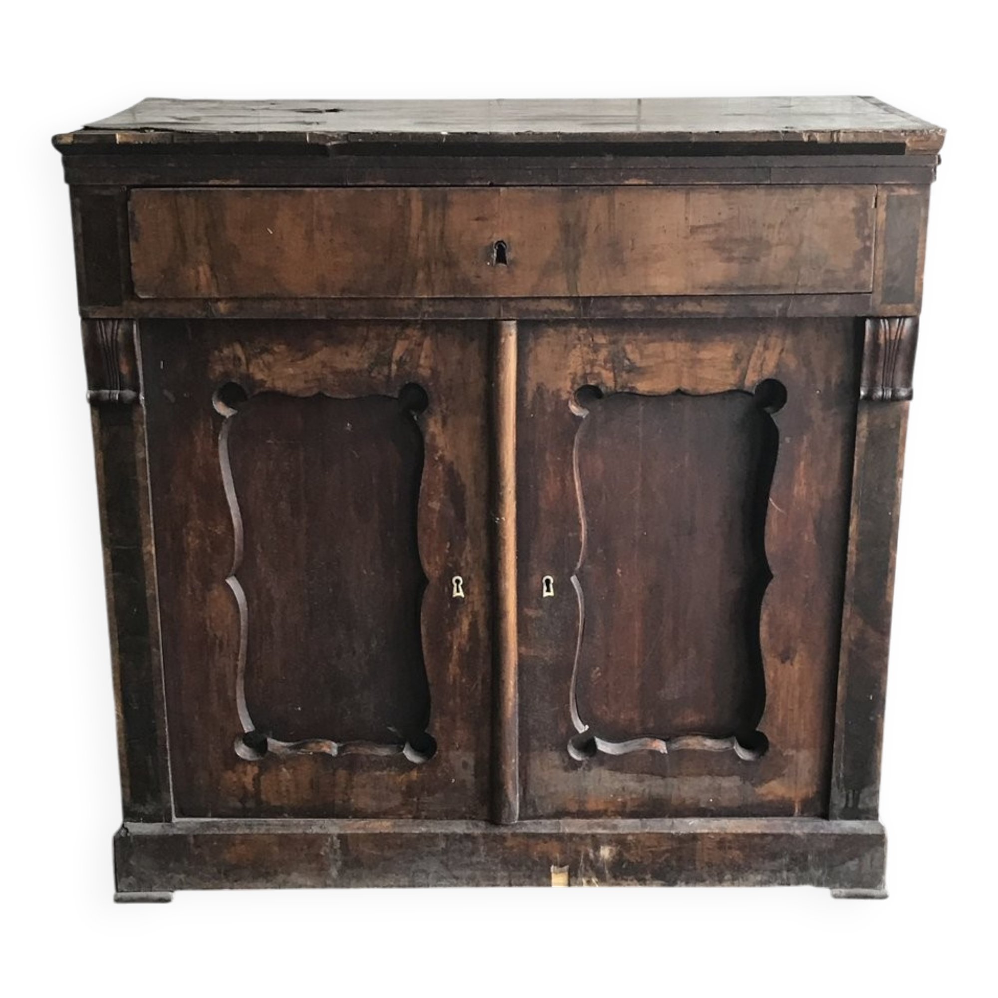 Vintage brown pine dresser with a painted top, moulded panels, and decorative locks.