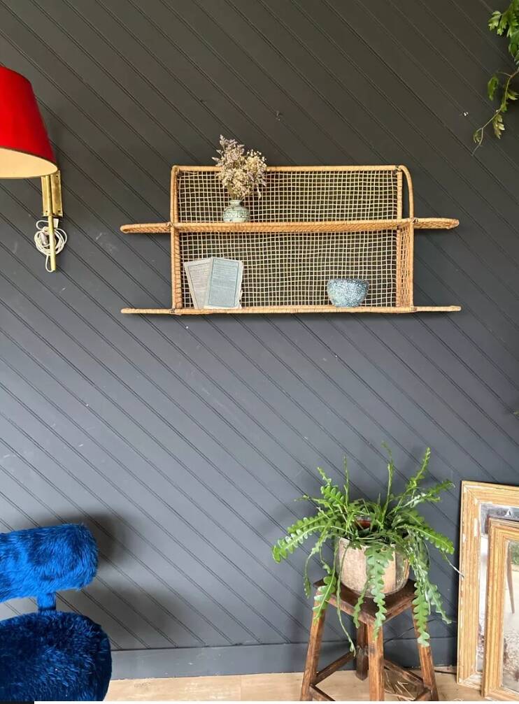 Steel and wicker wall shelf