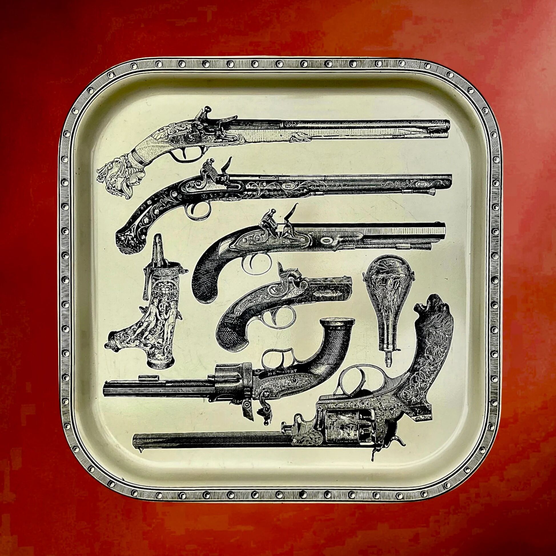 Vintage Fornasetti plateau with antique pistols décor – Italian design from the 1960s.