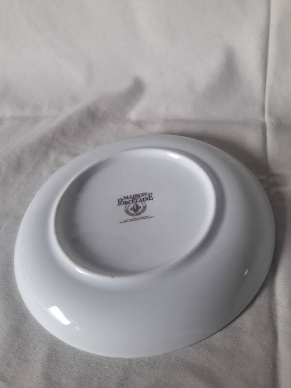 White porcelain drainer and dish