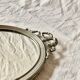 Louis XVI style oval metal wall mirror