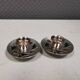 Silver-plated candle holders with inlaid red and green enamel