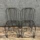 Pair of industrial design chairs in woven iron circa 1980