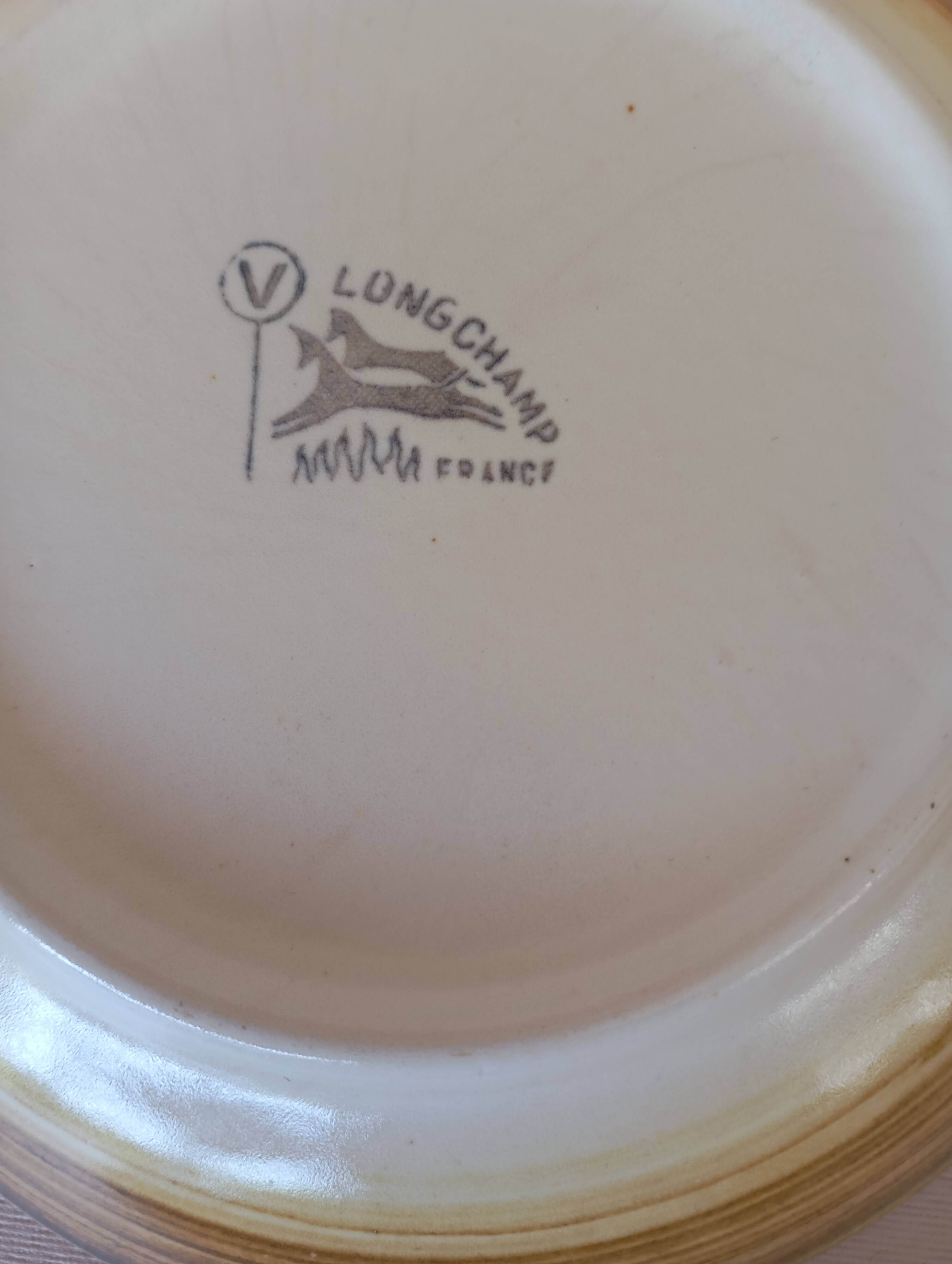 4 Longchamp calotte plates