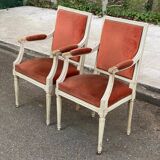 2 Louis XVI armchairs in solid wood and orange velvet.