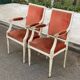 2 Louis XVI armchairs in solid wood and orange velvet.