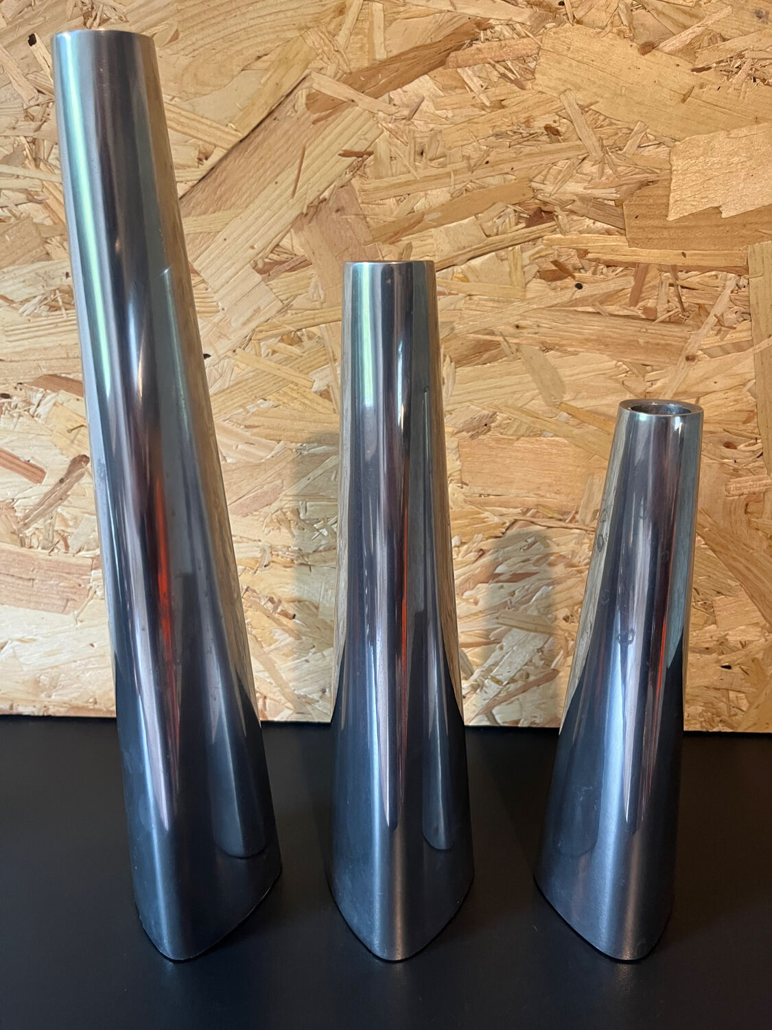 Trio of aluminum candle holders year 90