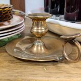 Brass thumb candle holder