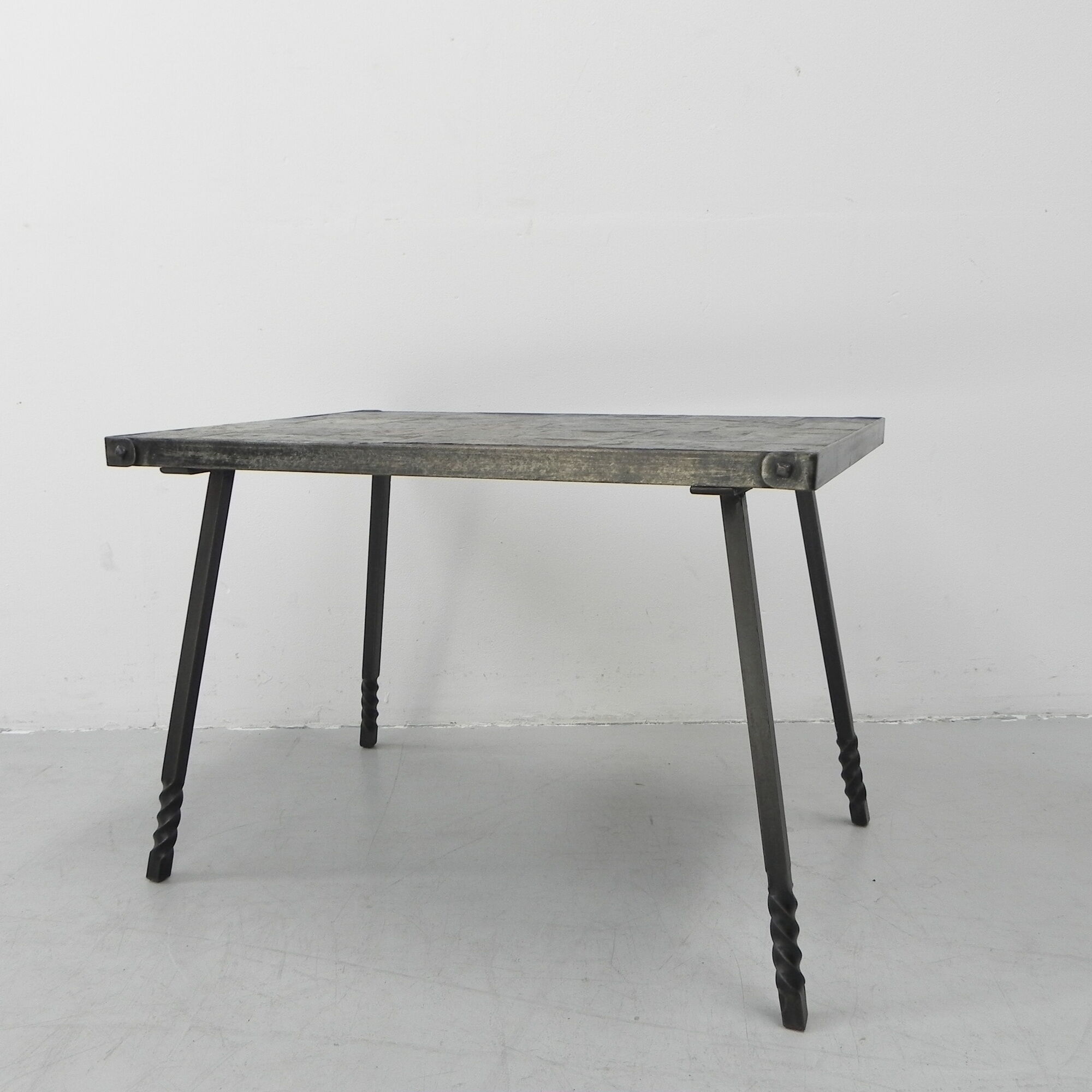 Brutalist coffee table with slate top