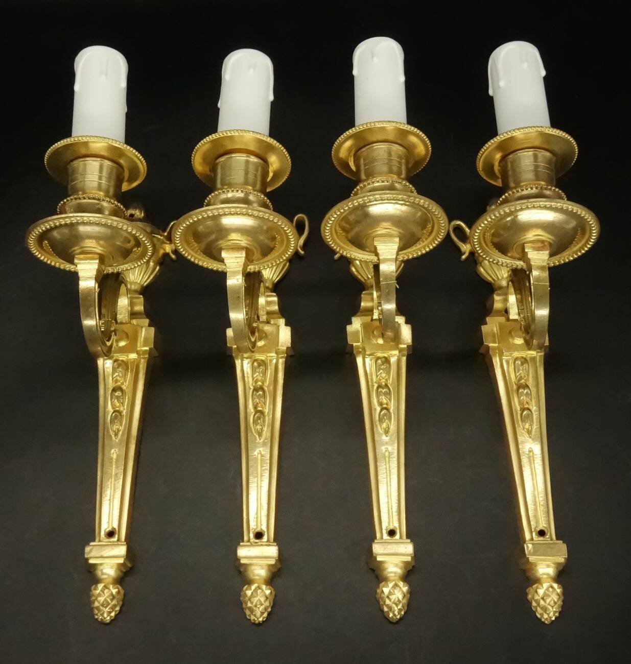 Set of 4 Louis XVI style 1-light wall lights from the 19th century - gilded bronze