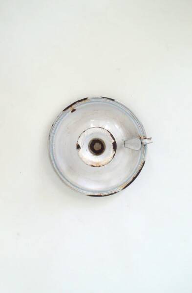 Enamelled candle holder