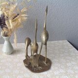 Golden brass herons