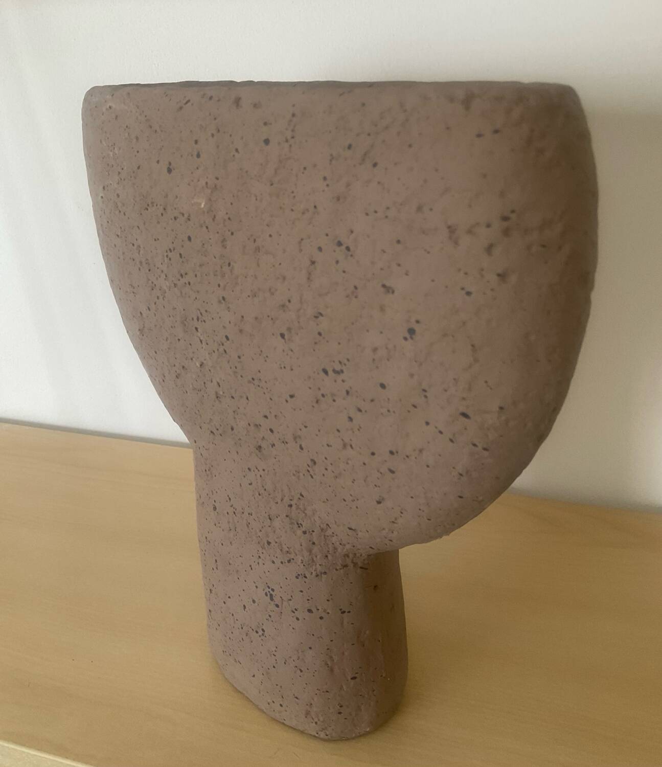 Vintage vase made of raw clay