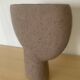 Vintage vase made of raw clay