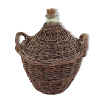 Demijohn in her braided wicker basket