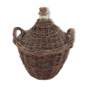 Demijohn in her braided wicker basket