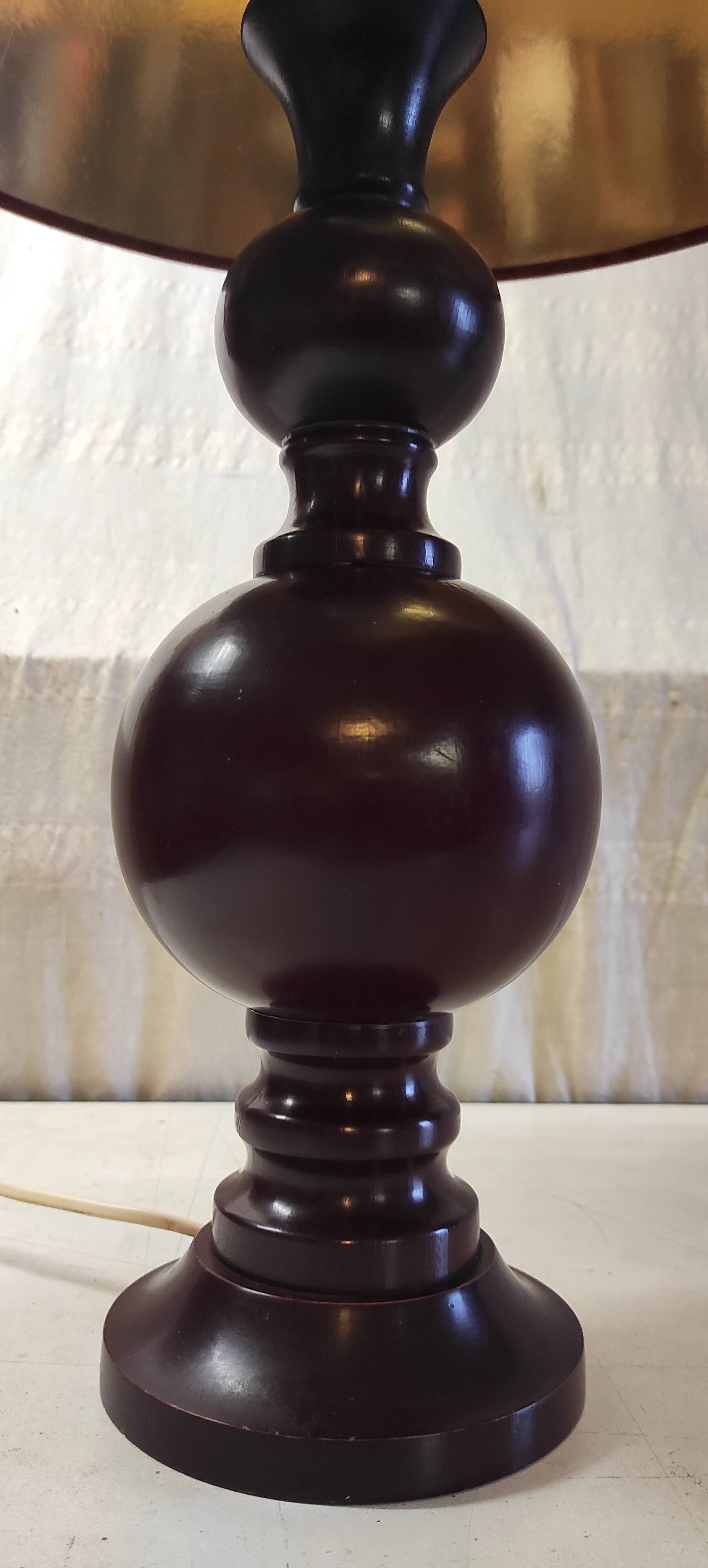 Turned wood table lamp in plum color - 1970s