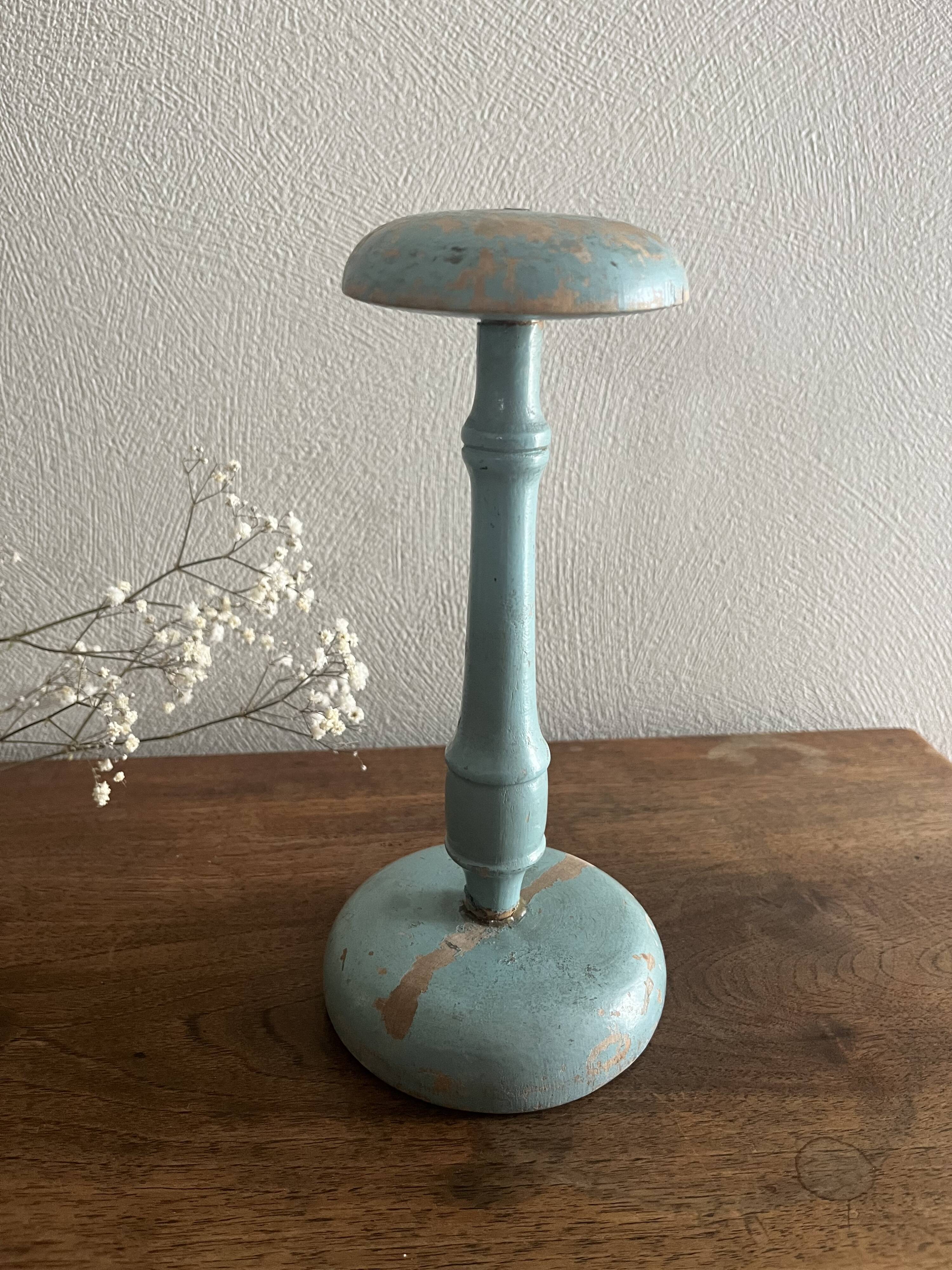 Weathered wooden hat rack