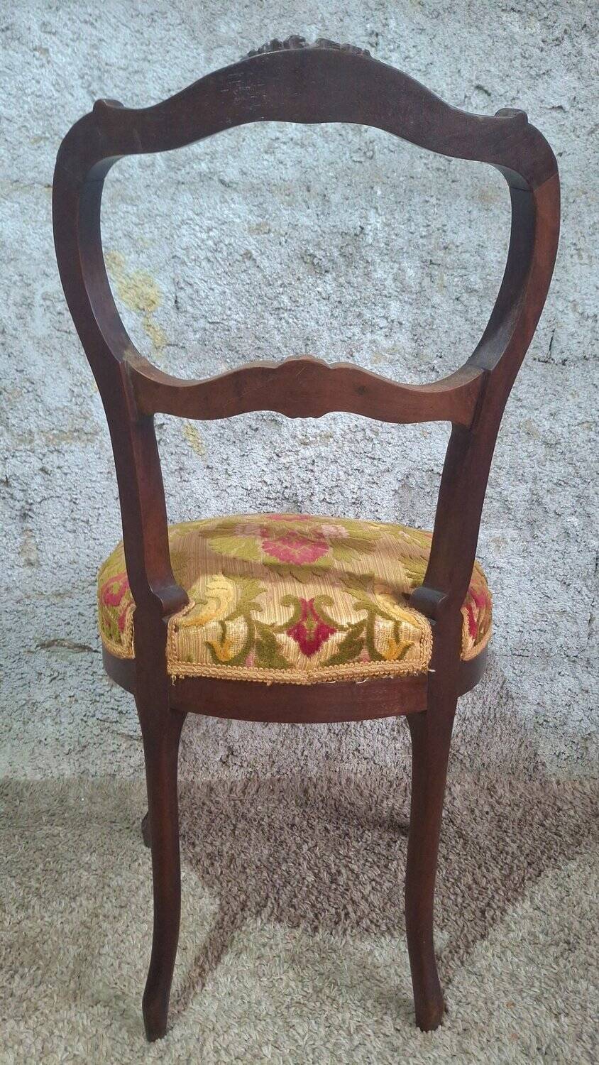 Carved walnut Napoleon III style velvet medallion chair