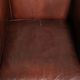 Sheepskin club armchair in English style with brown colour scheme