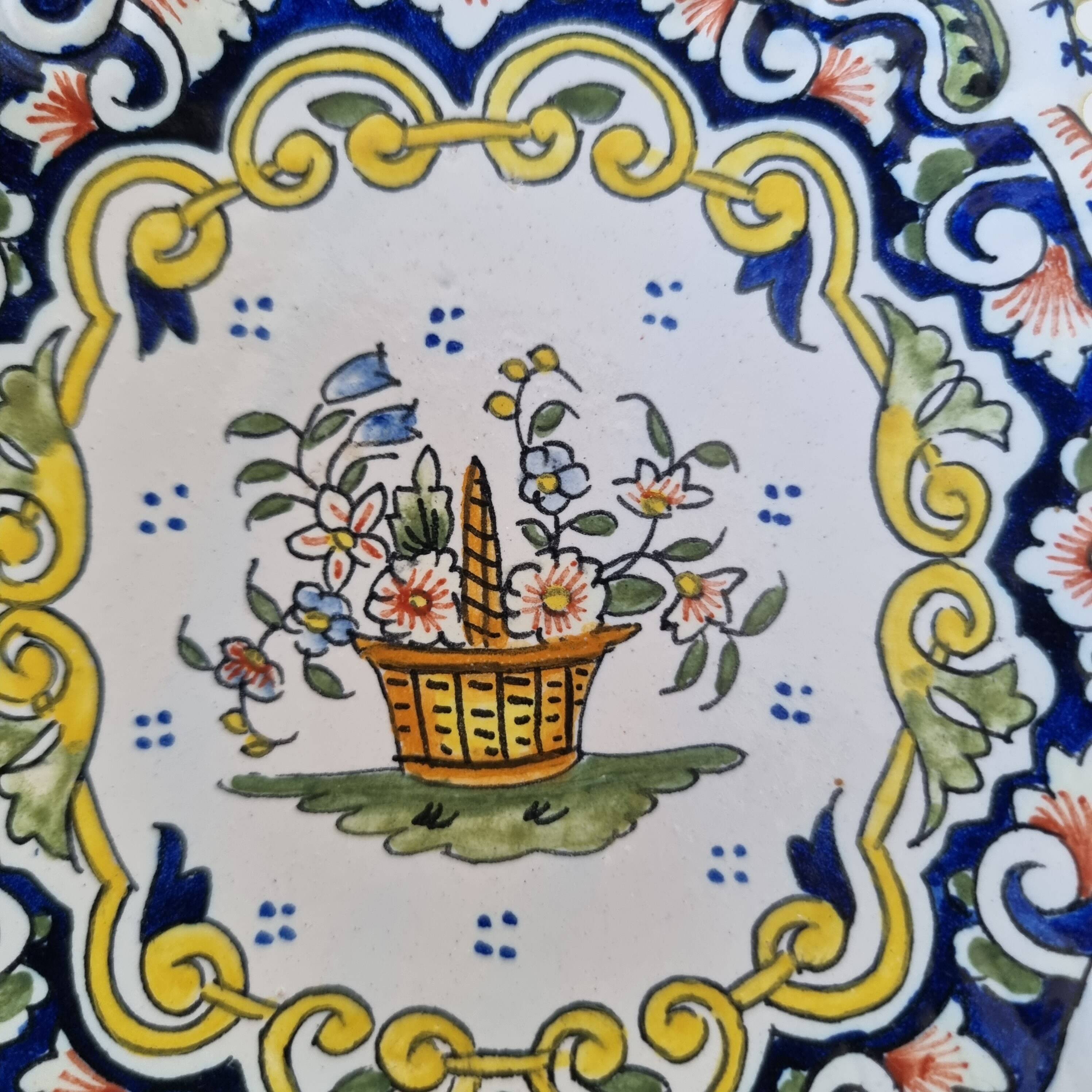 Decorative plate in Rouen earthenware, 19th century
