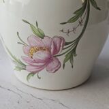 Vintage white porcelain vase by Revol with pink flowers.