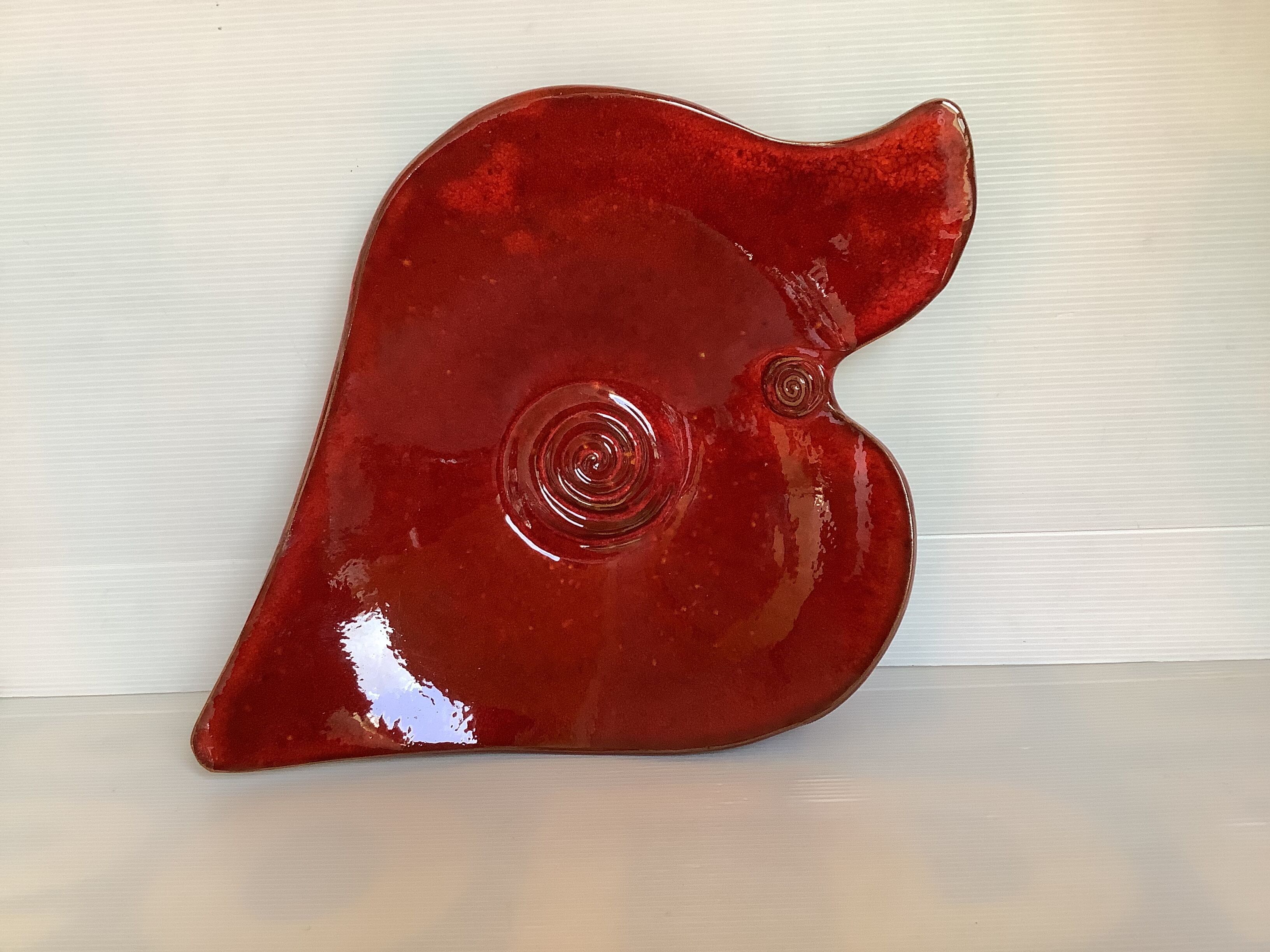 Red terracotta spiral pattern fruit bowl