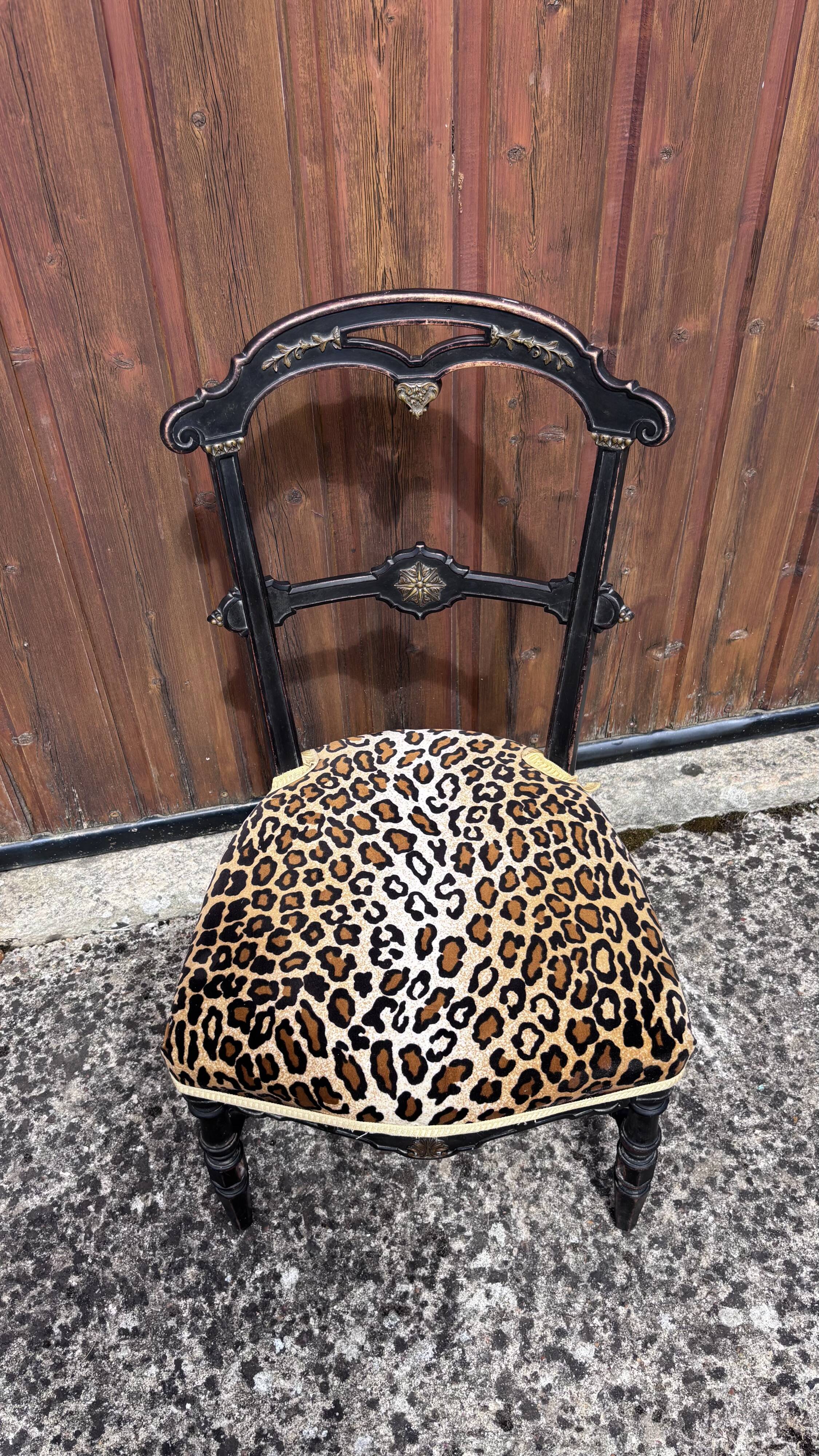 Napoleon III chair reinterpreted – Leopard seat & patinated black wood