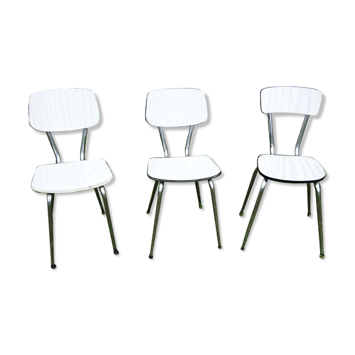3 old white Formica chairs