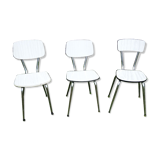 3 old white Formica chairs