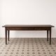 Narrow old wooden farmhouse table