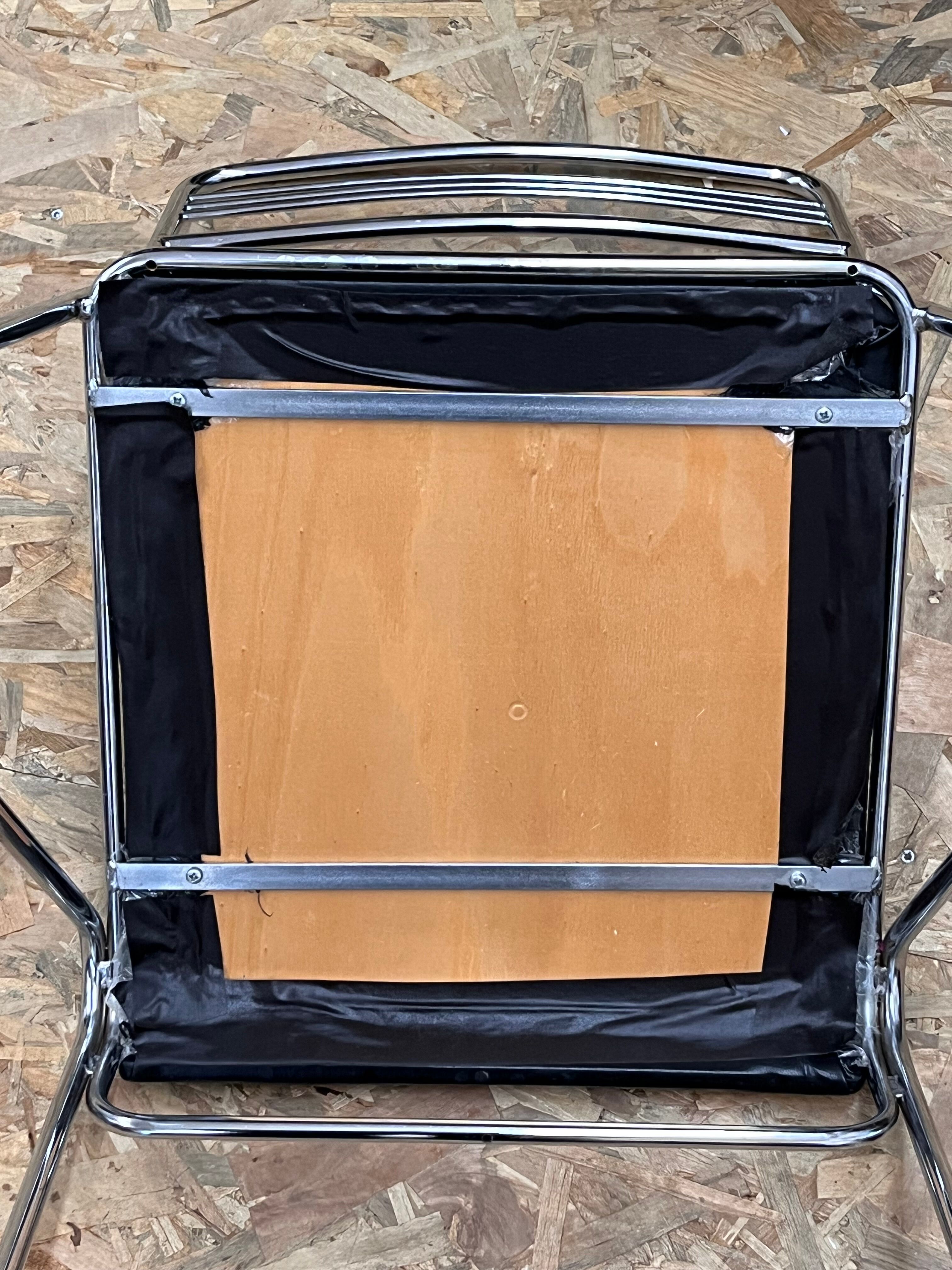 Three chrome and skai chairs from the 70s