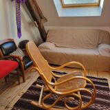 Rocking chair in arched wood and cane