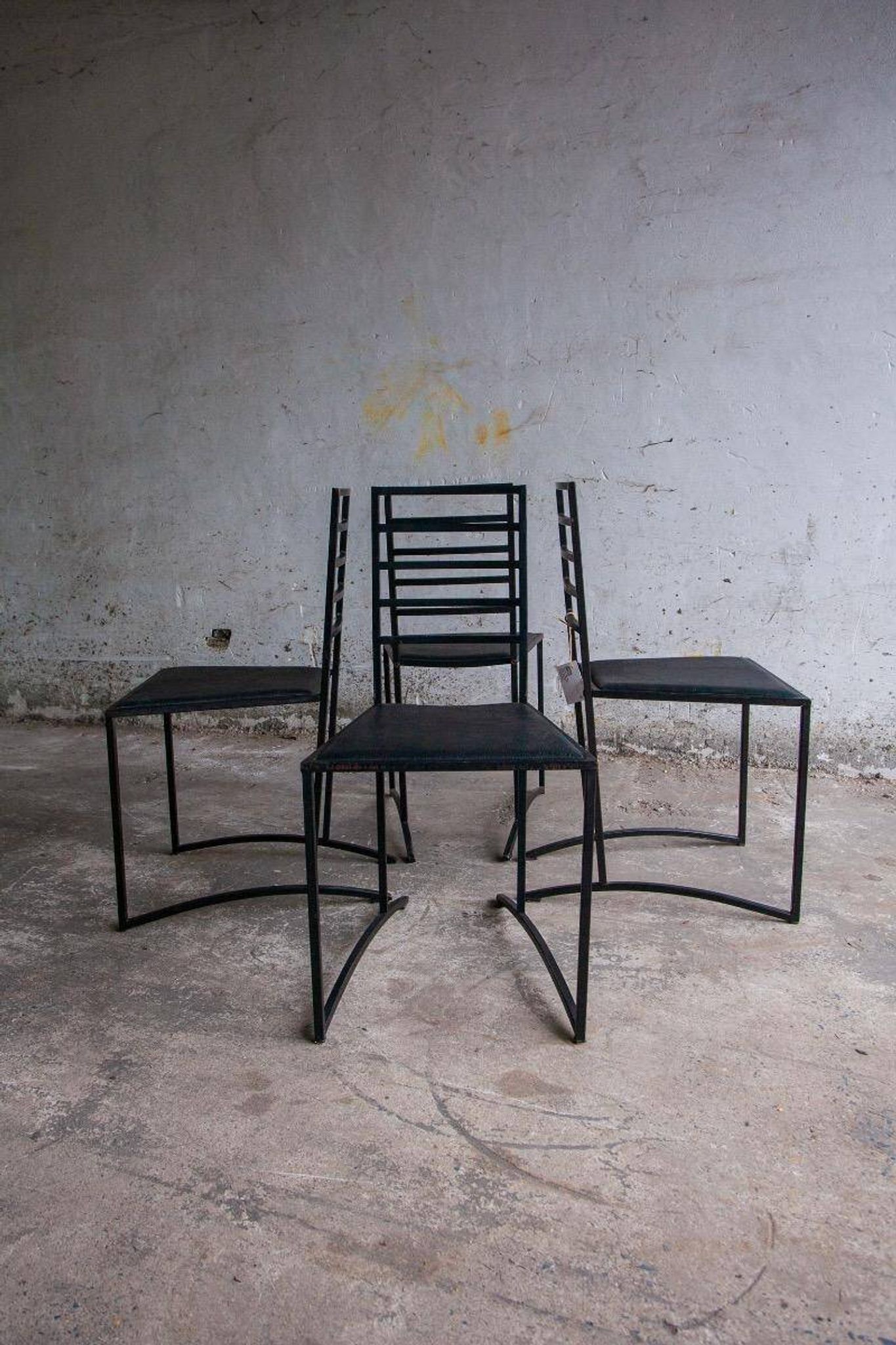 Set of 4 Black Steel Dining Chairs with Black Faux-Leather Seats — Minimalist Geometric Design