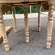 Round dining table with extendable leaves, Louis Philippe style, stripped in raw oak.