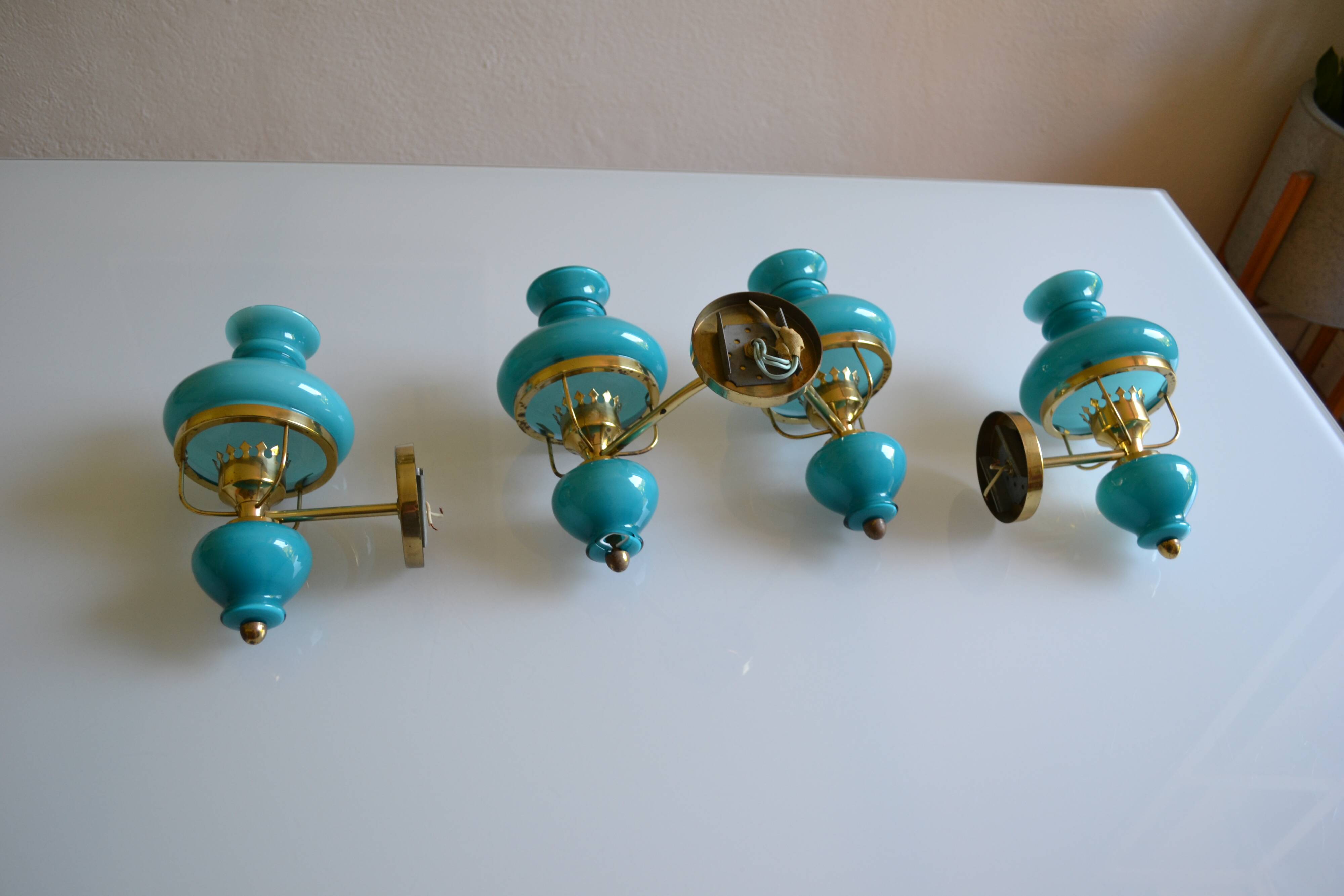 Series of 3 vintage brass and blue opaline wall lamps