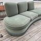 Rounded sofa with fringes