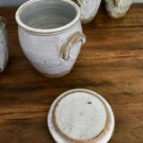 Suite of antique enamelled ceramic pots