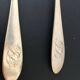 2 large silver-plated metal spoons (19th century)