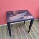 Japanese table in engraved lacquered wood
