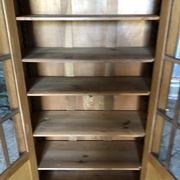 Vintage oak bookcase from the reconstruction period with 2 doors with small panes.